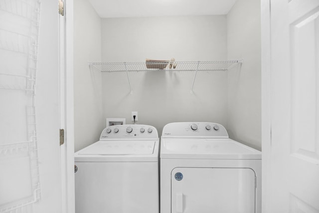 laundry area with washer and dryer