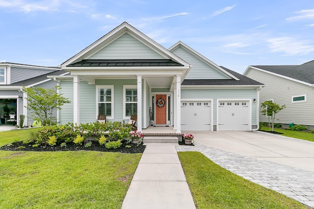 110 Bloomfield St, Summerville, SC 29486 - view of front of property featuring an attached garage, driveway, a porch, and a front yard