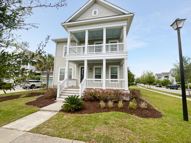3700 Maidstone Dr, Mount Pleasant, SC 29466 - view of front facade featuring a porch, a balcony, and a front lawn