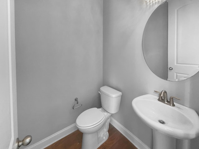 3700 Maidstone Dr, Mount Pleasant, SC 29466 - bathroom with a sink, baseboards, wood finished floors, and toilet