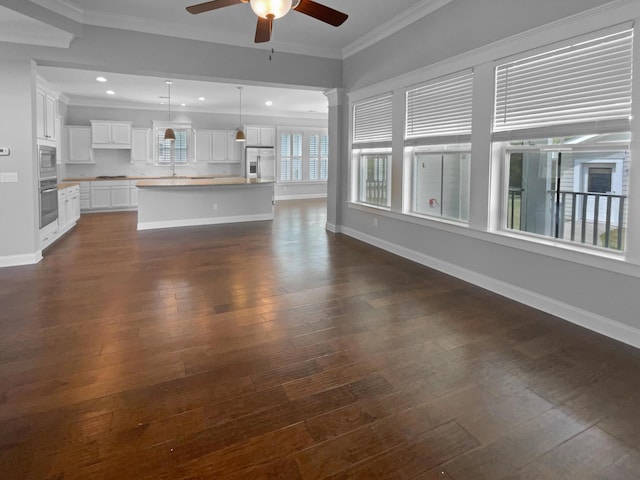 3700 Maidstone Dr, Mount Pleasant, SC 29466 - unfurnished living room featuring ceiling fan, dark wood-type flooring, ornamental molding, recessed lighting, and baseboards