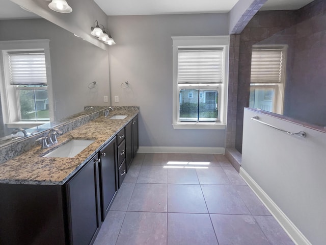 3700 Maidstone Dr, Mount Pleasant, SC 29466 - bathroom with tile patterned floors, double vanity, a sink, and baseboards