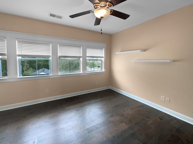 3700 Maidstone Dr, Mount Pleasant, SC 29466 - spare room featuring visible vents, baseboards, ceiling fan, and dark wood-style floors