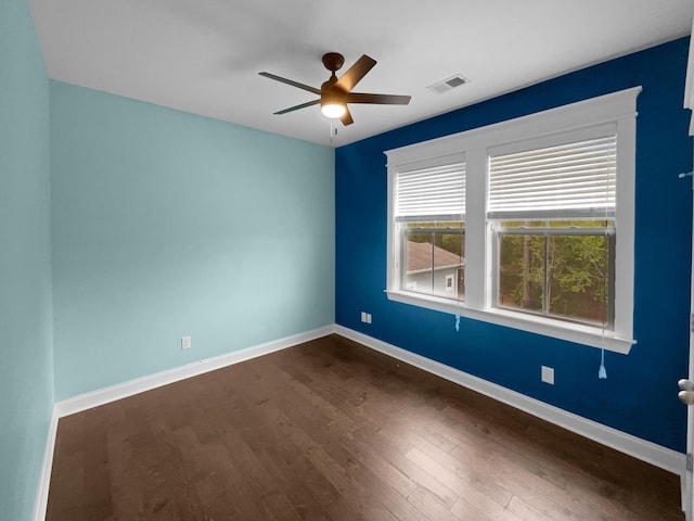 3700 Maidstone Dr, Mount Pleasant, SC 29466 - spare room with visible vents, ceiling fan, baseboards, and dark wood-style floors