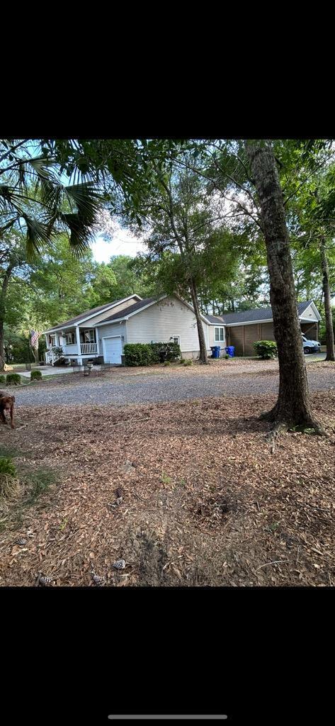 5423 Buckeye Rd, Hollywood, SC 29449 - view of front of home featuring a garage