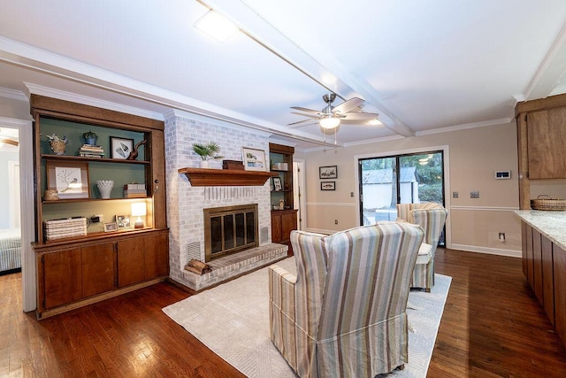 living room featuring crown molding, a brick fireplace, radiator heating unit, dark hardwood / wood-style floors, and beam ceiling