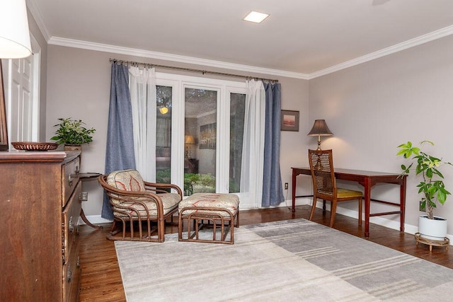 living area featuring ornamental molding and dark hardwood / wood-style floors