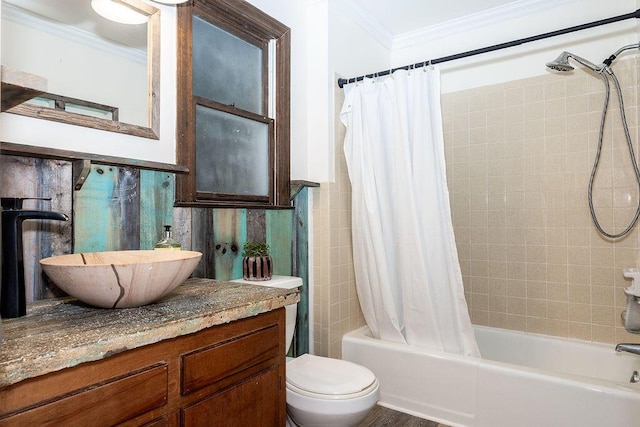 full bathroom featuring tile walls, vanity, ornamental molding, toilet, and shower / bath combo with shower curtain