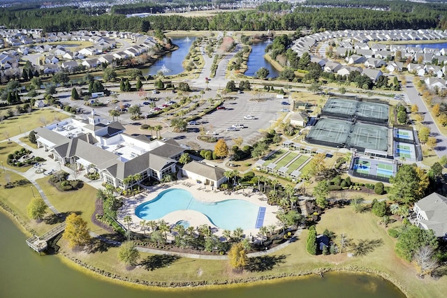 bird's eye view with a water view