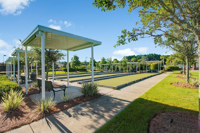 view of home's community featuring a lawn