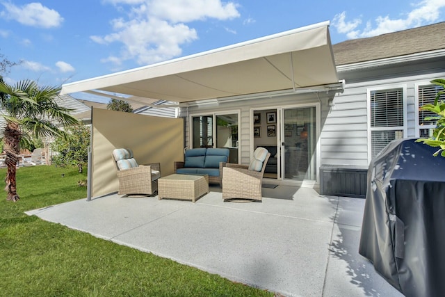 view of patio / terrace with area for grilling and outdoor lounge area