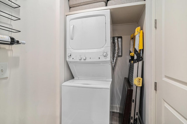 145 Pier View St Unit 111, Charleston, SC 29492 - laundry room featuring stacked washing machine and dryer