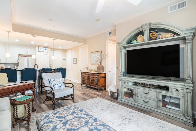 145 Pier View St Unit 111, Charleston, SC 29492 - living area with wood finished floors, ceiling fan, ornamental molding, and recessed lighting