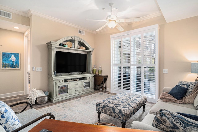 145 Pier View St Unit 111, Charleston, SC 29492 - living room with crown molding, ceiling fan, and wood finished floors