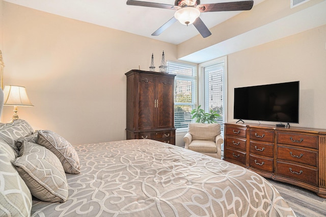 145 Pier View St Unit 111, Charleston, SC 29492 - bedroom with light wood-type flooring and ceiling fan