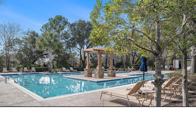 145 Pier View St Unit 111, Charleston, SC 29492 - community pool with a patio area and a pergola