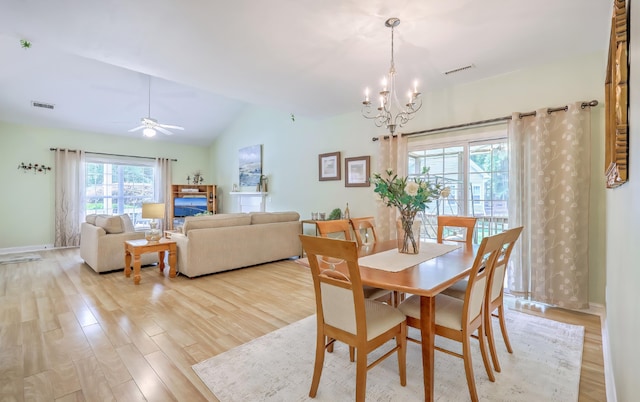 5347 Sundial Ct, North Charleston, SC 29418 - dining area with a chandelier, light wood-style floors, lofted ceiling, baseboards, and ceiling fan