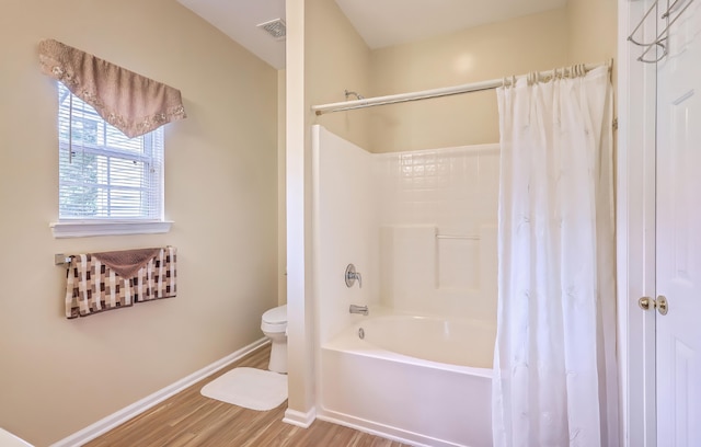 5347 Sundial Ct, North Charleston, SC 29418 - full bathroom with wood finished floors, toilet, baseboards, and shower / bath combo