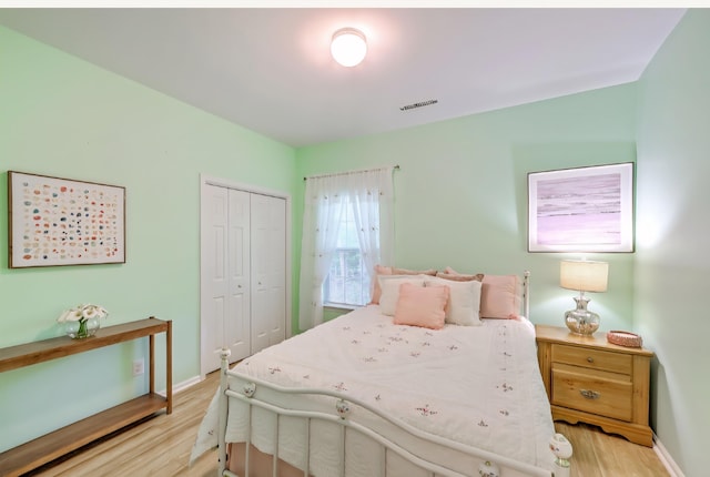 5347 Sundial Ct, North Charleston, SC 29418 - bedroom featuring light wood-style floors, a closet, and baseboards