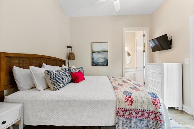 112 E Huron Ave Unit C, Folly Beach, SC 29439 - bedroom featuring ceiling fan, ensuite bath, and wood finished floors