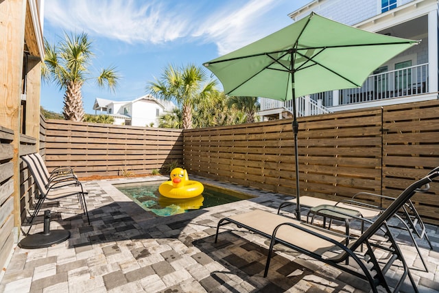 112 E Huron Ave Unit C, Folly Beach, SC 29439 - view of patio with a fenced backyard