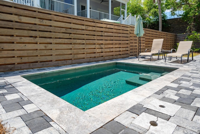 112 E Huron Ave Unit C, Folly Beach, SC 29439 - view of pool with a patio, fence, and a swimming pool