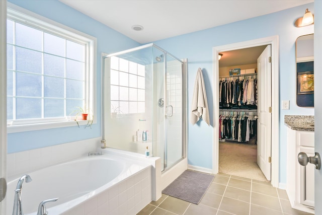 2324 Town Woods Rd, Charleston, SC 29414 - full bathroom featuring a stall shower, plenty of natural light, a garden tub, and a walk in closet