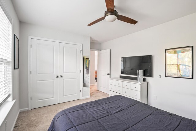 2324 Town Woods Rd, Charleston, SC 29414 - bedroom with light carpet, a closet, multiple windows, and a ceiling fan