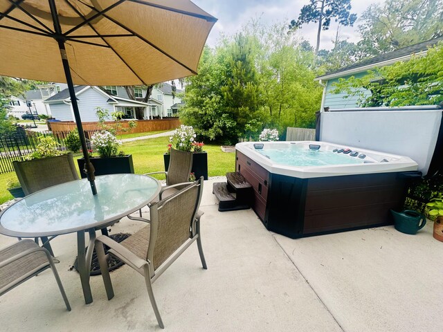 2324 Town Woods Rd, Charleston, SC 29414 - view of patio / terrace featuring a hot tub and outdoor dining area