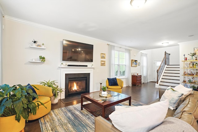 2324 Town Woods Rd, Charleston, SC 29414 - living room with wood finished floors, ornamental molding, a glass covered fireplace, and stairway