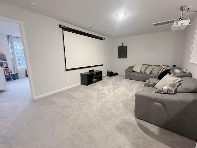 home theater with light carpet