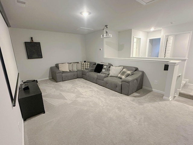 living room with light carpet, visible vents, and baseboards