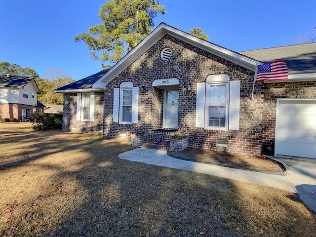 view of front of house with a garage