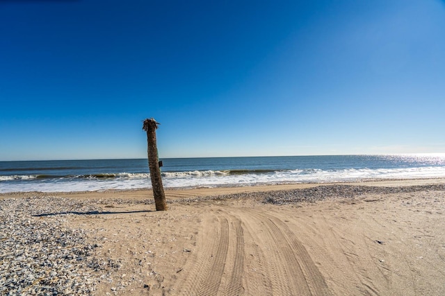 view of water feature featuring a beach view