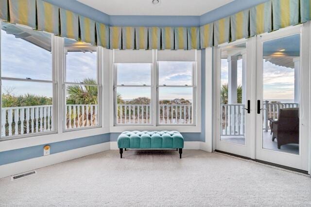 sunroom / solarium with a healthy amount of sunlight