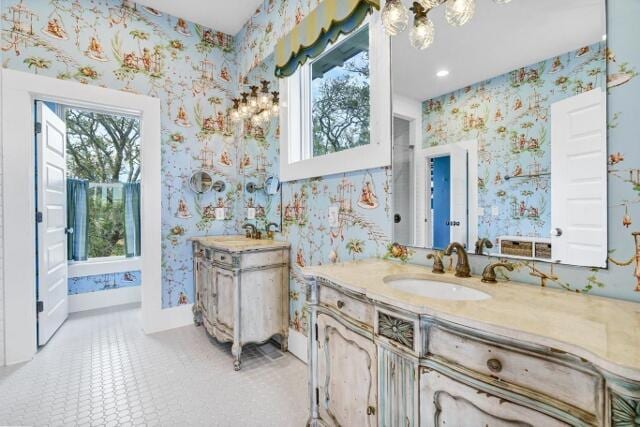 bathroom with tile patterned floors and vanity