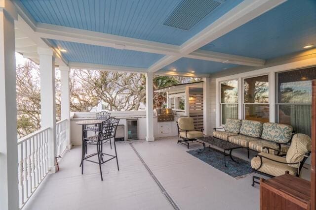 sunroom featuring a healthy amount of sunlight