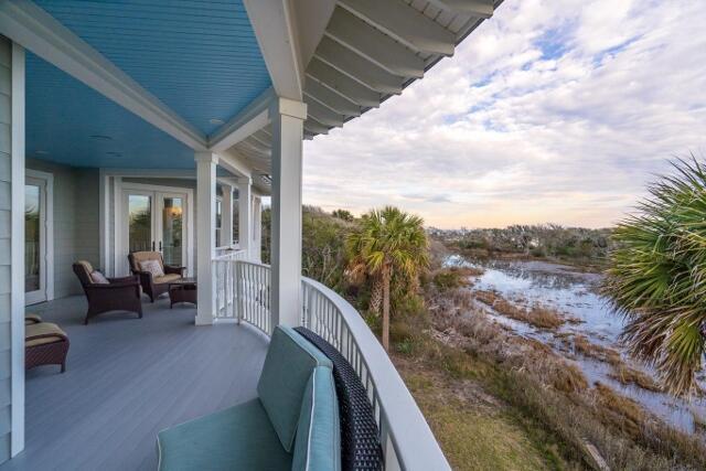 balcony at dusk with french doors