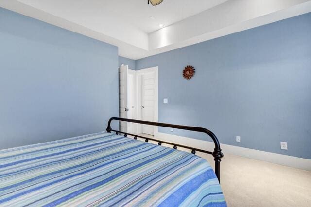 unfurnished bedroom with carpet floors