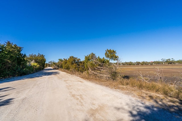 view of road featuring a rural view