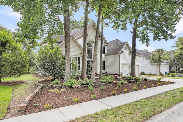 1311 Royal Links Dr, Mount Pleasant, SC 29466 - traditional home with concrete driveway and an attached garage