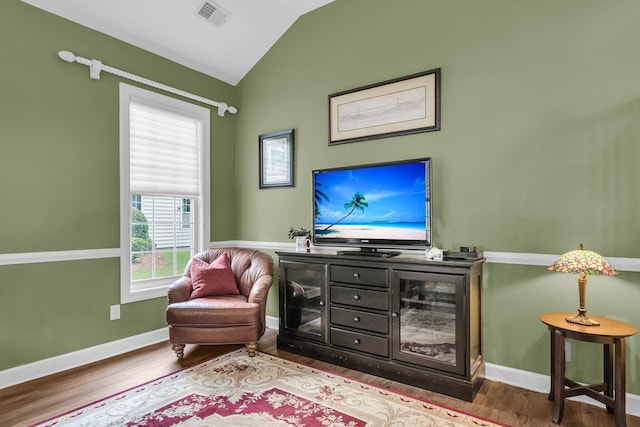 1311 Royal Links Dr, Mount Pleasant, SC 29466 - sitting room with wood finished floors and lofted ceiling