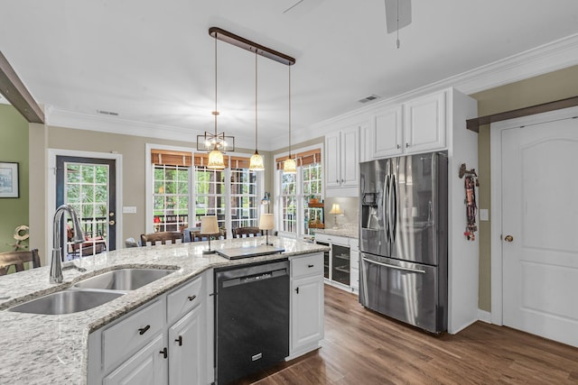 1311 Royal Links Dr, Mount Pleasant, SC 29466 - kitchen featuring dishwasher, stainless steel fridge, dark wood-style floors, white cabinetry, and ornamental molding