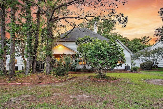 1311 Royal Links Dr, Mount Pleasant, SC 29466 - view of front facade with a chimney and a front yard