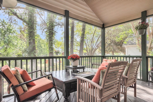 1311 Royal Links Dr, Mount Pleasant, SC 29466 - sunroom featuring vaulted ceiling, an outdoor living space, and outdoor dining space