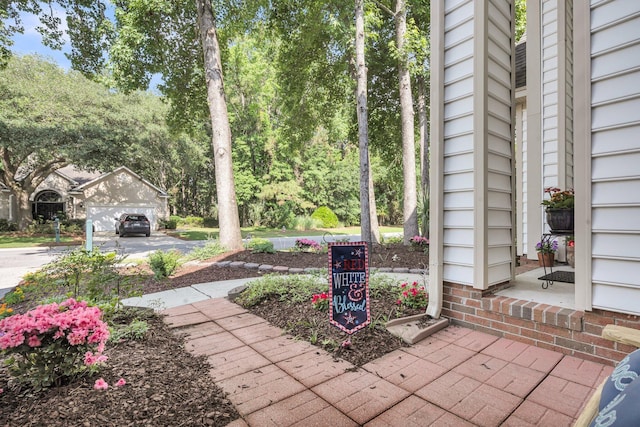 1311 Royal Links Dr, Mount Pleasant, SC 29466 - view of patio with a garage