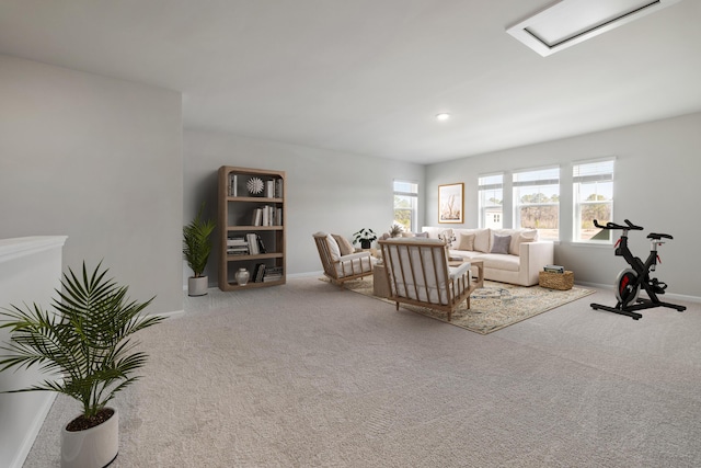 living area with recessed lighting, baseboards, and carpet