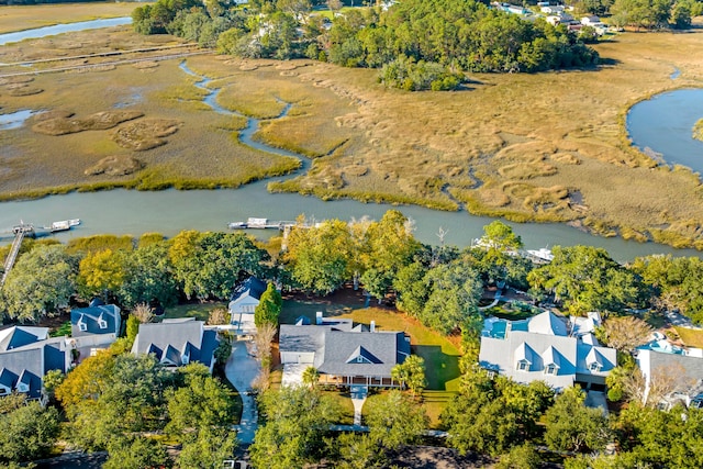 birds eye view of property with a residential view and a water view