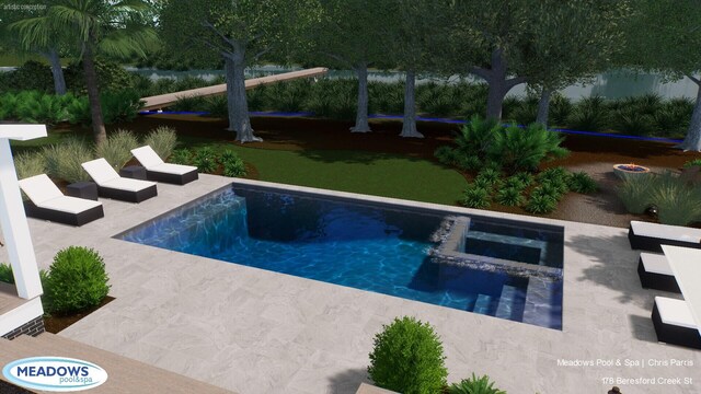 outdoor pool with a patio area and a hot tub