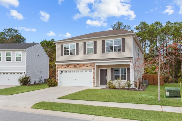 view of front of home featuring cooling unit, a garage, and a front yard